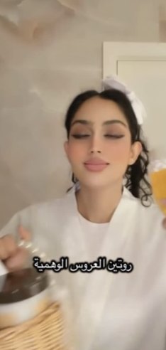 Creator in a bride robe during the routine