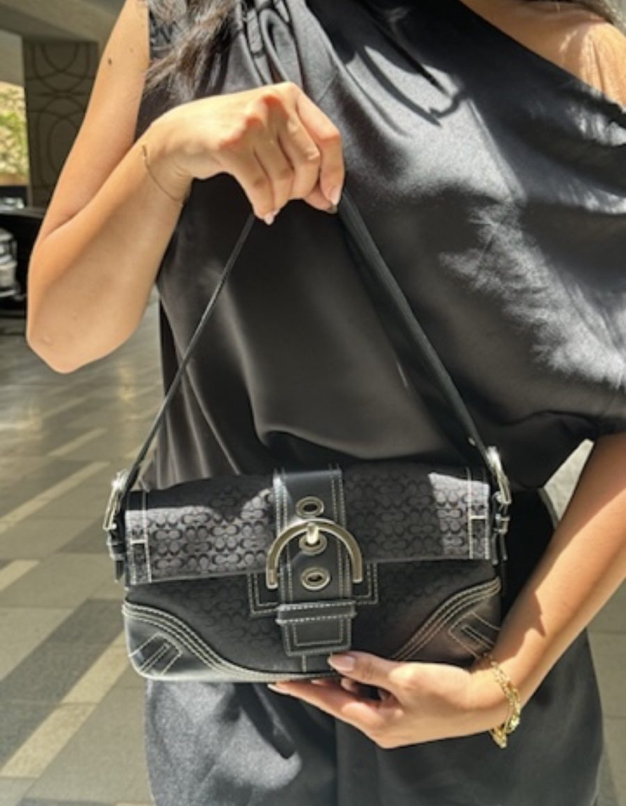 Black monogram shoulder bag styled with a black satin top